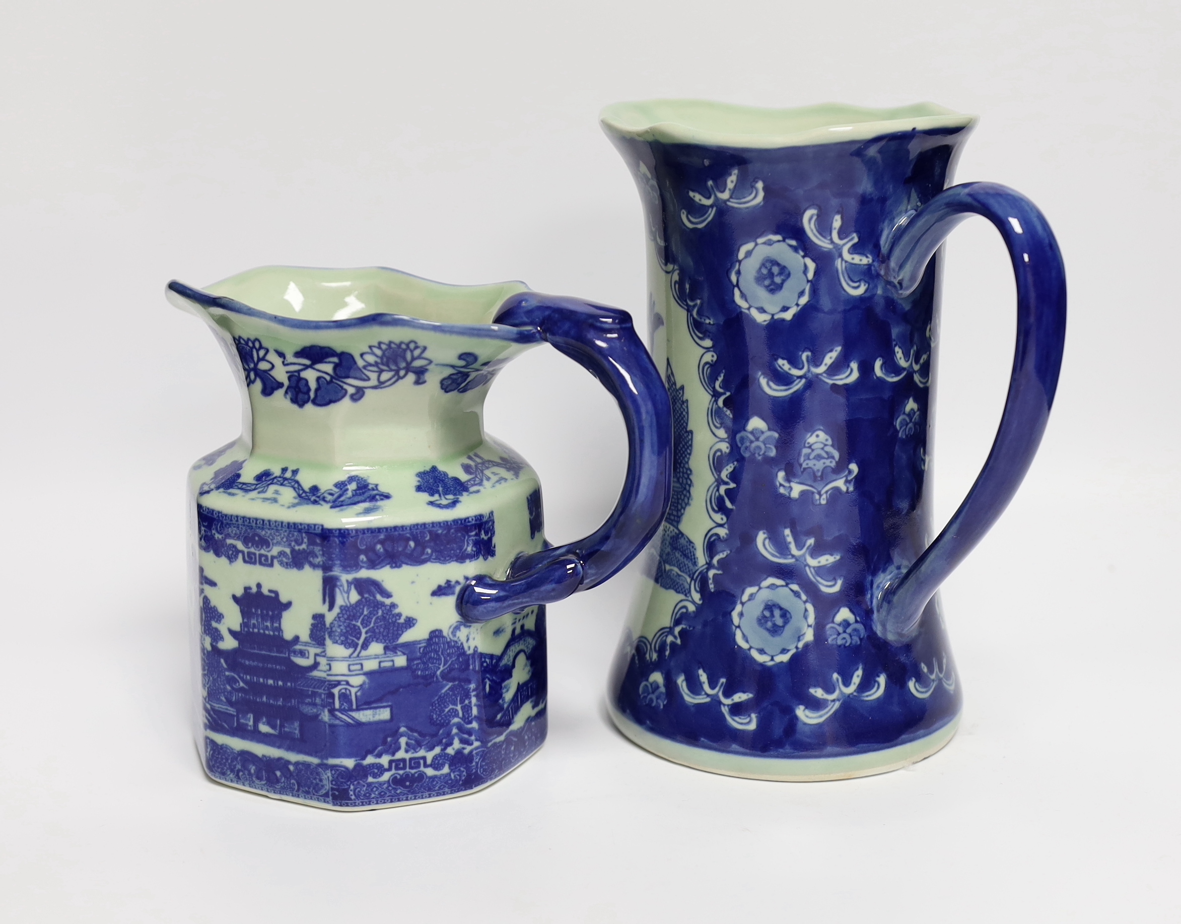 Two 20th century Chinese blue and white jugs, tallest 22cm